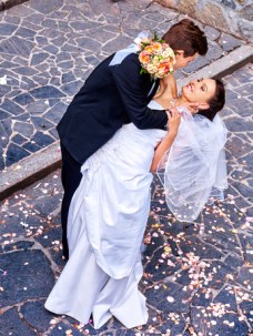 38740256 - groom carries his bride over back. outdoor.